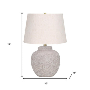HomeRoots 22" Cream Concrete Urn Table Lamp - Modern Design with Soft Linen Shade for Ambient Illumination 545870