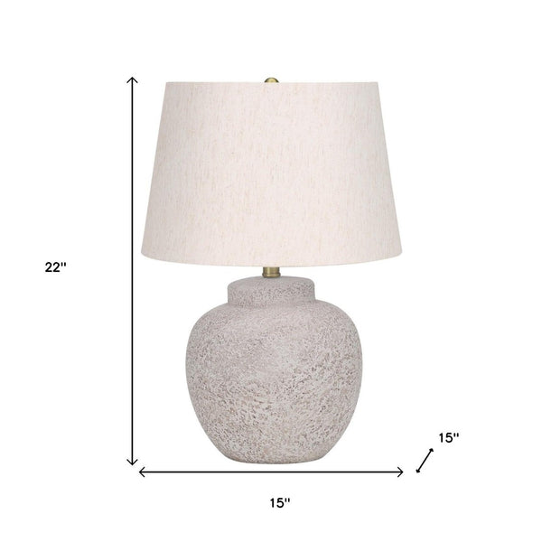 HomeRoots 22" Cream Concrete Urn Table Lamp - Modern Design with Soft Linen Shade for Ambient Illumination 545870