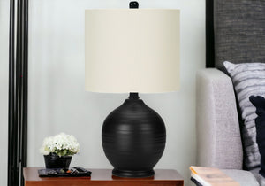 Homeroots 17" Black Ceramic Round Table Lamp With Ivory Drum Shade   545874