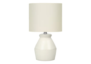 Homeroots 17" Cream Ceramic Geometric Table Lamp With Cream Drum Shade   545875