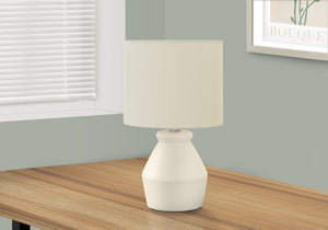 Homeroots 17" Cream Ceramic Geometric Table Lamp With Cream Drum Shade   545875