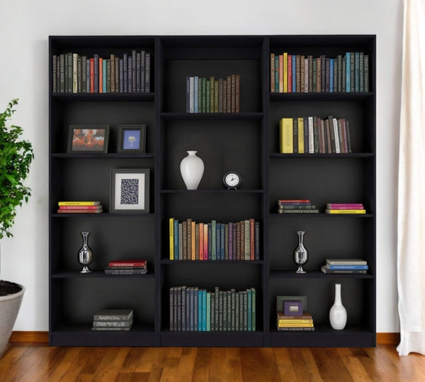 HomeRoots Set of Three Modern Black Wood Bookcases – Stylish Four-Tier Storage for Home or Office Organization 546348