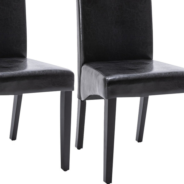 Homeroots Set Of Two Black Upholstered Faux Leather Dining Parsons Chairs  Wood 546388