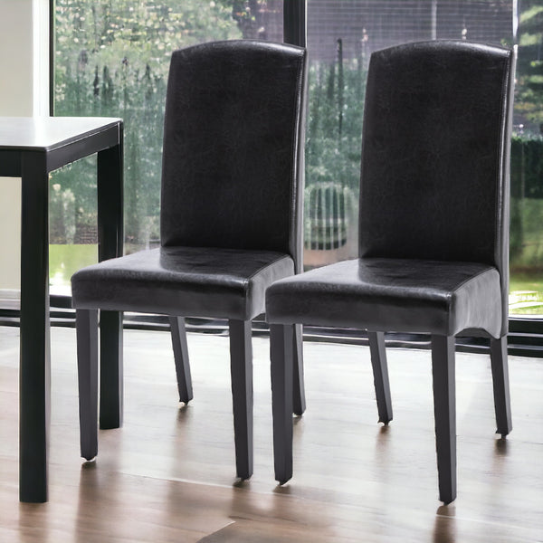 Homeroots Set Of Two Black Upholstered Faux Leather Dining Parsons Chairs  Wood 546388