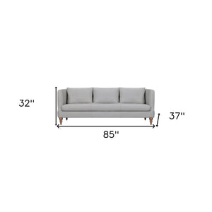 Homeroots 85" Gray Leather Sofa With Brown Legs   546411