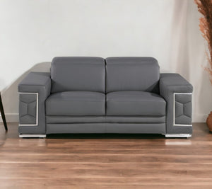 HomeRoots 70" Contemporary Leather Loveseat with Silver Accents, Adjustable Headrests, and Sleek Steel Legs DARK GRAY 546442