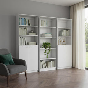 HomeRoots Set of Three Elegant White Wood Five-Tier Modular Bookcases with Doors for Stylish Storage Solutions 546620