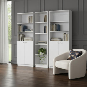 HomeRoots Set of Three White Wood Modular Bookcases - Stylish Five-Tier Shelves with Hidden Storage Doors 546621