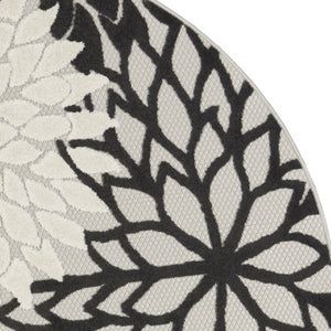 HomeRoots 5' Black and White Round Floral Area Rug - Durable Indoor/Outdoor Accent for High-Traffic Spaces 546648