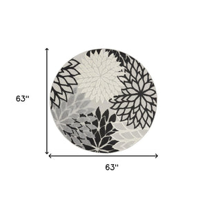 HomeRoots 5' Black and White Round Floral Area Rug - Durable Indoor/Outdoor Accent for High-Traffic Spaces 546648