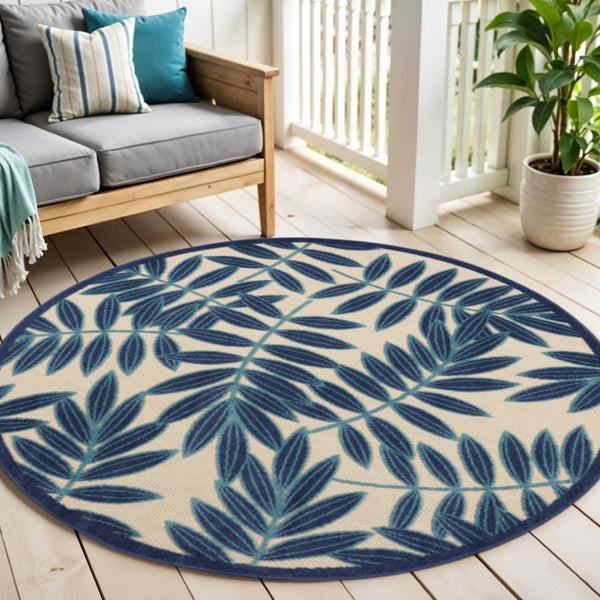 HomeRoots 5' Navy Blue and Beige Round Palm Leaf Rug - Durable Indoor Outdoor Area Rug for Coastal Charm 5' X 5' 546650