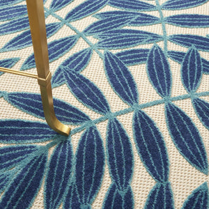 HomeRoots 5' Navy Blue and Beige Round Palm Leaf Rug - Durable Indoor Outdoor Area Rug for Coastal Charm 5' X 5' 546650