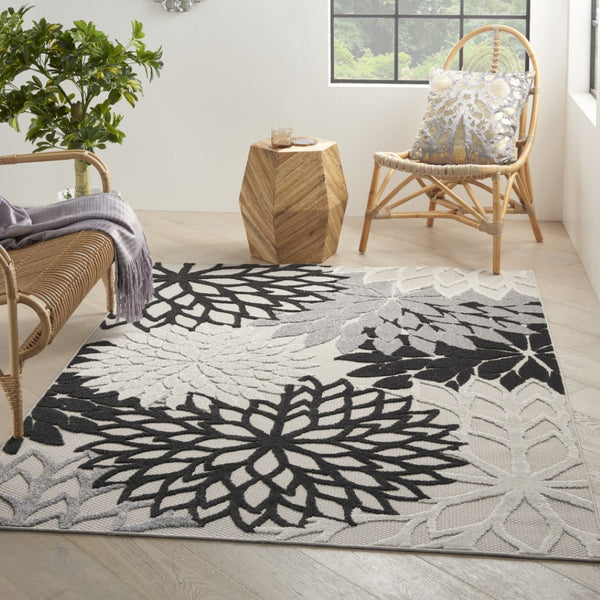 HomeRoots 5' X 8' Elegant Black and White Floral Area Rug – Durable, Water-Resistant for Indoor & Outdoor Use 546664