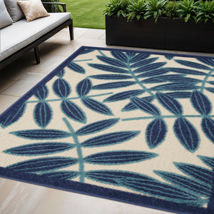 HomeRoots 5' Navy Blue & Ivory Palm Leaf Area Rug - Durable Indoor/Outdoor Flatwoven Design for Coastal Style 546665