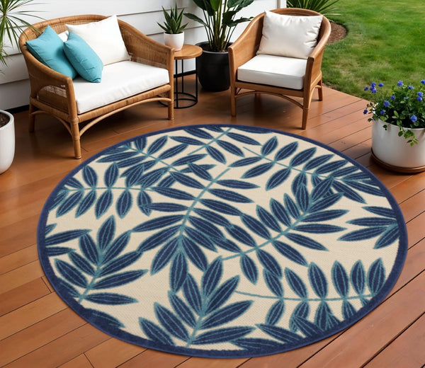 HomeRoots 5' Navy Blue and Beige Round Palm Leaf Rug - Durable Indoor Outdoor Area Rug for Coastal Charm 8' Round 546666