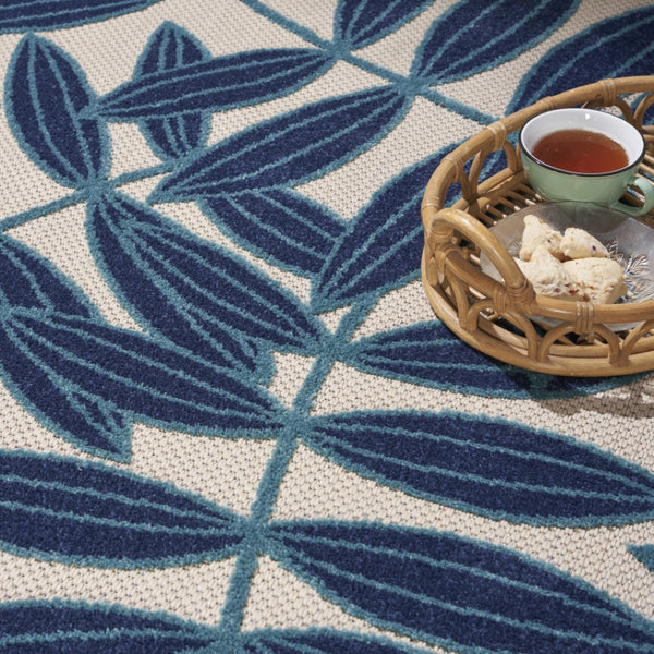 HomeRoots 5' Navy Blue and Beige Round Palm Leaf Rug - Durable Indoor Outdoor Area Rug for Coastal Charm 8' Round 546666
