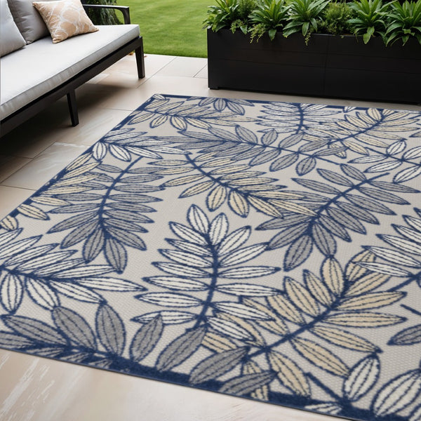 HomeRoots 5' Coastal-Inspired Navy Blue and Ivory Botanical Indoor Outdoor Area Rug for Versatile Spaces 5' X 8' 546668
