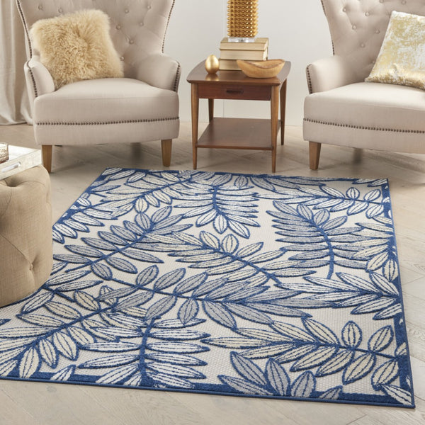 HomeRoots 5' Coastal-Inspired Navy Blue and Ivory Botanical Indoor Outdoor Area Rug for Versatile Spaces 5' X 8' 546668