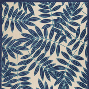 HomeRoots 5' Navy Blue and Beige Round Palm Leaf Rug - Durable Indoor Outdoor Area Rug for Coastal Charm 6' X 9' 546679