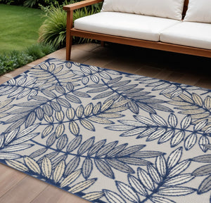 HomeRoots 5' Coastal-Inspired Navy Blue and Ivory Botanical Indoor Outdoor Area Rug for Versatile Spaces 6' X 9' 546680