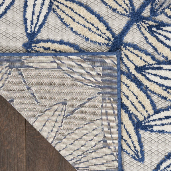 HomeRoots 5' Coastal-Inspired Navy Blue and Ivory Botanical Indoor Outdoor Area Rug for Versatile Spaces 6' X 9' 546680
