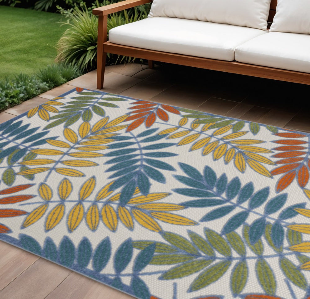 HomeRoots 6' Indoor Outdoor Area Rug - Vibrant Ivory Botanical Leaves in Blue, Orange, Green for Any Space 546683