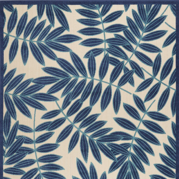 HomeRoots 5' Navy Blue and Beige Round Palm Leaf Rug - Durable Indoor Outdoor Area Rug for Coastal Charm 7' X 10' 546687