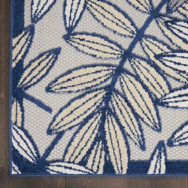 HomeRoots 5' Coastal-Inspired Navy Blue and Ivory Botanical Indoor Outdoor Area Rug for Versatile Spaces 7' X 10' 546689