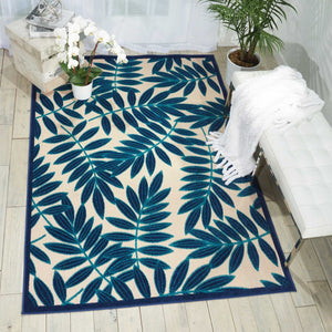 HomeRoots 8' Navy Blue and Ivory Palm Leaf Area Rug - Versatile Indoor/Outdoor Design for Modern Spaces 546694