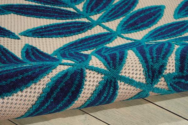 HomeRoots 8' Navy Blue and Ivory Palm Leaf Area Rug - Versatile Indoor/Outdoor Design for Modern Spaces 546694