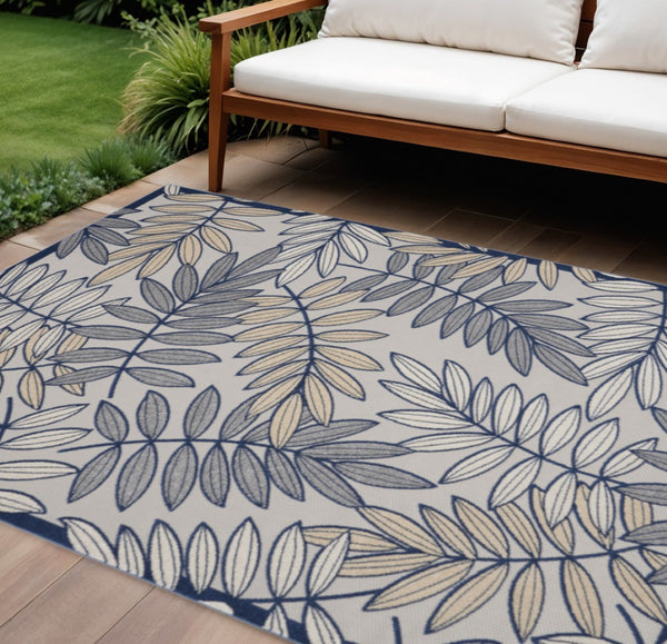 HomeRoots 5' Coastal-Inspired Navy Blue and Ivory Botanical Indoor Outdoor Area Rug for Versatile Spaces 8' X 11' 546696