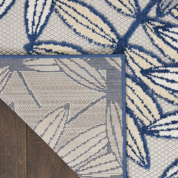 HomeRoots 5' Coastal-Inspired Navy Blue and Ivory Botanical Indoor Outdoor Area Rug for Versatile Spaces 8' X 11' 546696