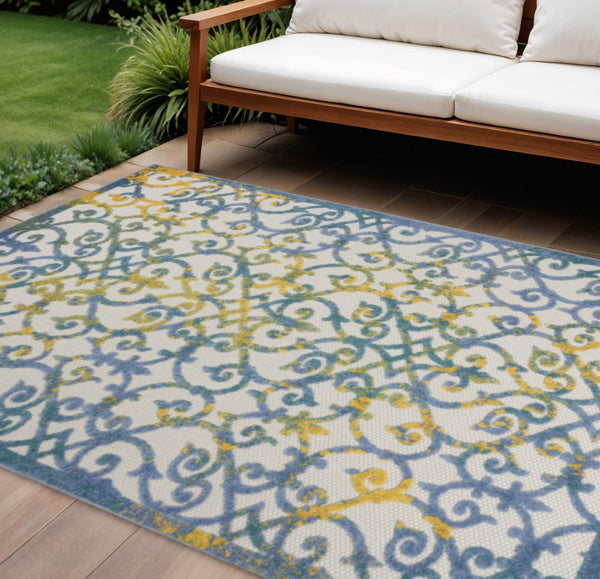 HomeRoots 5' Indoor Outdoor Trellis Area Rug in Ivory, Blue, and Yellow - Durable, Stylish & Easy to Clean 8' X 11' 546810