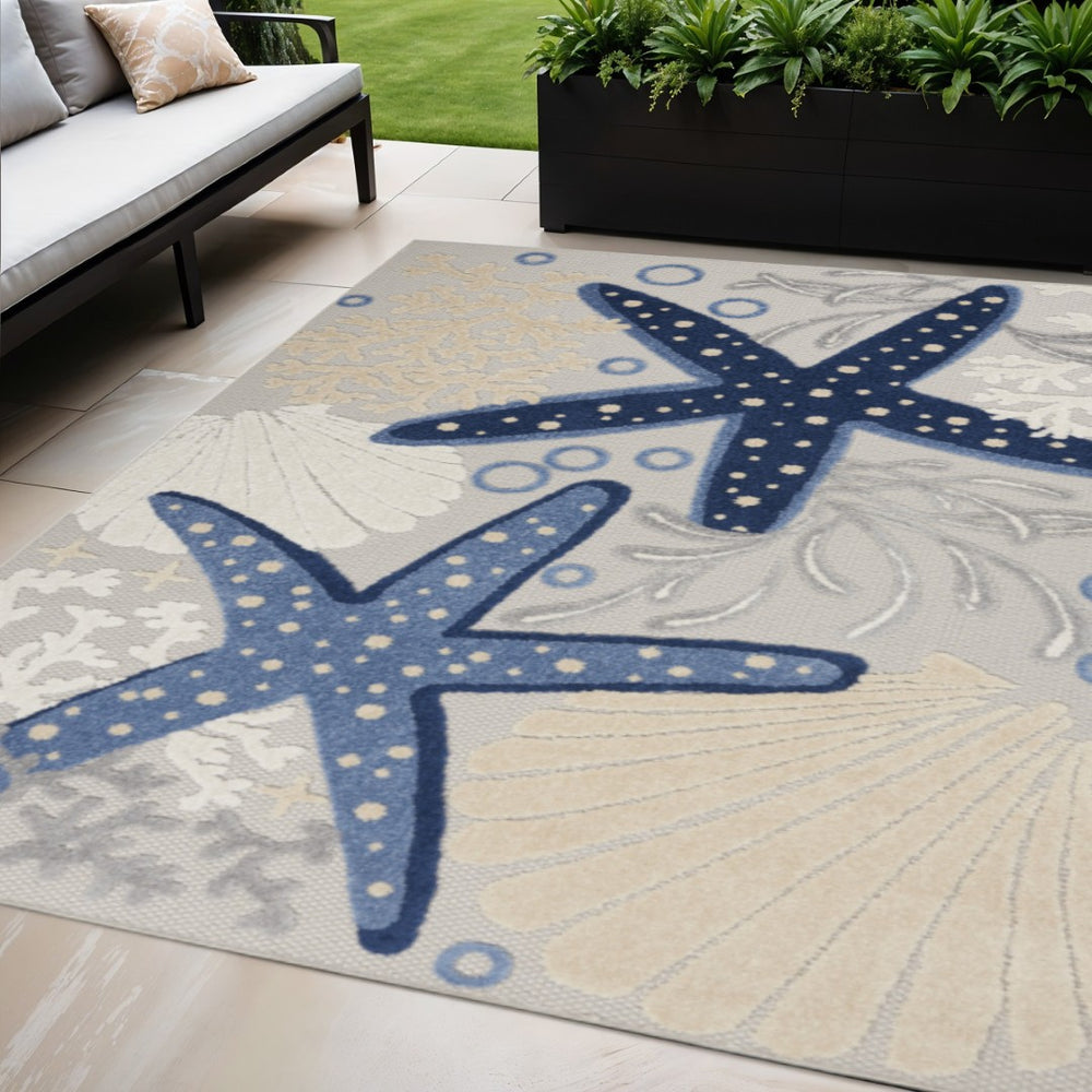 HomeRoots 5' X 8' Navy Blue Starfish Area Rug - Stylish Indoor/Outdoor Coastal Décor for Home & Patio Use 546824