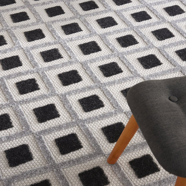 HomeRoots 7' Black and White Geometric Area Rug - Versatile Indoor Outdoor Design, Durable and Easy to Clean 546861