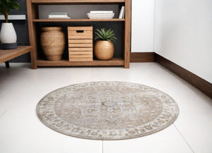 Homeroots 5' Beige And Ivory Round Floral Medallion Power Loom Washable Area Rug  Polyester 546909