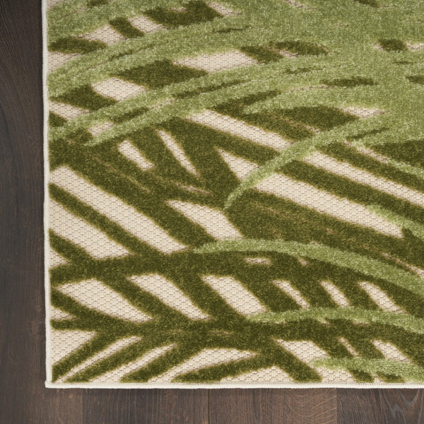 HomeRoots 5' Tropical Ivory and Green Palm Leaf Area Rug - Durable Indoor Outdoor Design for Versatile Spaces 548057