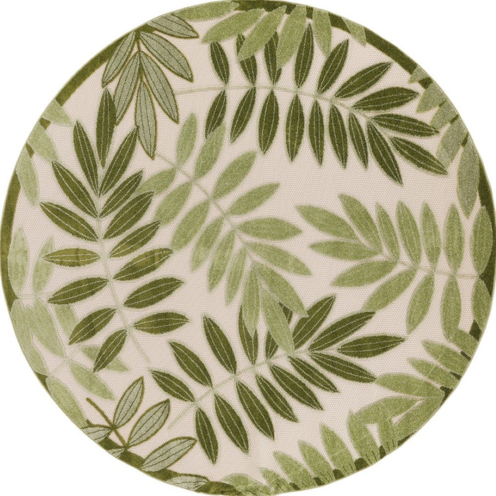 HomeRoots 8' Ivory and Green Round Palm Leaf Rug - Durable, Stylish Indoor/Outdoor Area Rug for Modern Spaces 548066