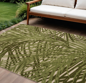 HomeRoots 6' X 9' Ivory Green Palm Leaf Area Rug – Durable Indoor Outdoor Decor for Coastal Living Spaces 548080