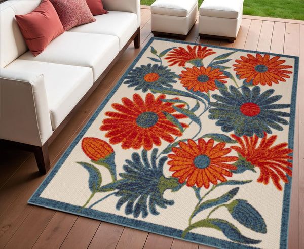 HomeRoots 8' X 11' Floral Indoor Outdoor Area Rug in Ivory, Blue & Orange - Durable, Easy Care, Versatile Design 548093