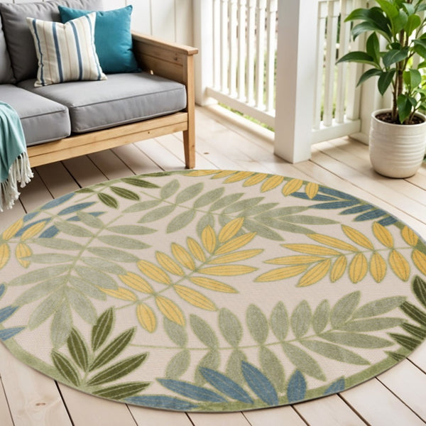 HomeRoots 5' Tropical Palm Leaf Area Rug - Durable Indoor/Outdoor Round Rug in Green, Yellow, Ivory Colors 548137