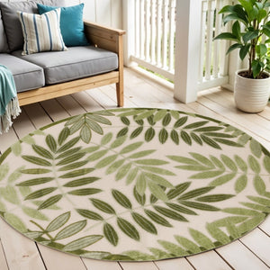 HomeRoots 5' Coastal-Inspired Ivory and Green Round Palm Leaf Rug for Indoor/Outdoor Durability and Style 548143