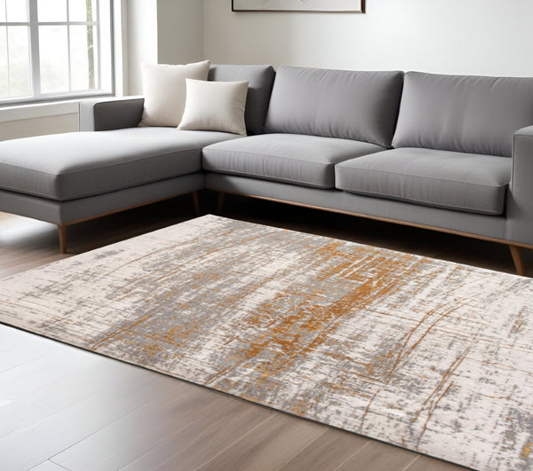 HomeRoots 3'' Gray and Gold Abstract Non-Skid Area Rug for High-Traffic Spaces - Elegant & Durable Design 6' X 8' 548390
