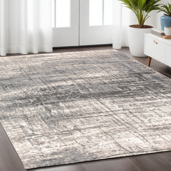 HomeRoots 3' Gray and White Abstract Non-Skid Area Rug - Modern Design for Entryways and Kitchens, Easy Care 5' X 7' 548397