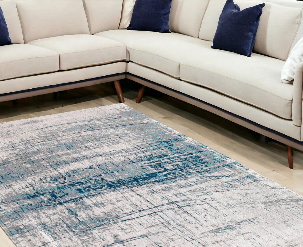 HomeRoots 9' X 13' Blue and Gray Abstract Area Rug – Non-Skid, Contemporary Design for High-Traffic Spaces 548409