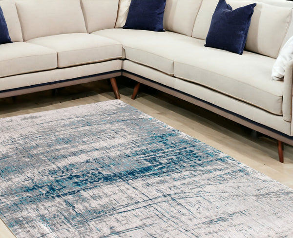 HomeRoots 9' X 13' Blue and Gray Abstract Area Rug – Non-Skid, Contemporary Design for High-Traffic Spaces 548409