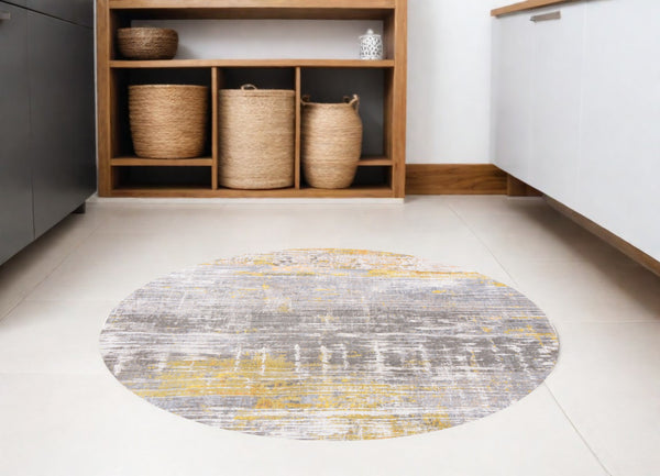 Homeroots 5' Gray And Yellow Round Abstract Non Skid Area Rug  100% Pet 548486
