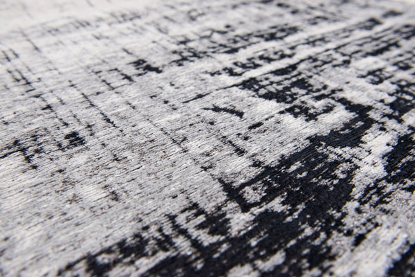 HomeRoots 9' X 13' Modern Black and White Abstract Area Rug with Non-Skid Backing for High-Traffic Spaces 548553