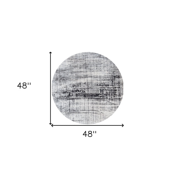 Homeroots 5' Black And White Round Abstract Non Skid Area Rug  100% Pet 548554