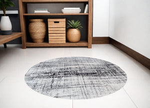 Homeroots 5' Black And White Round Abstract Non Skid Area Rug  100% Pet 548554